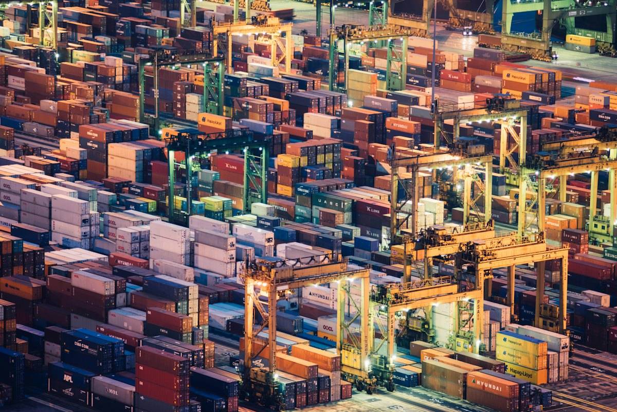 Shipping containers stacked in a terminal